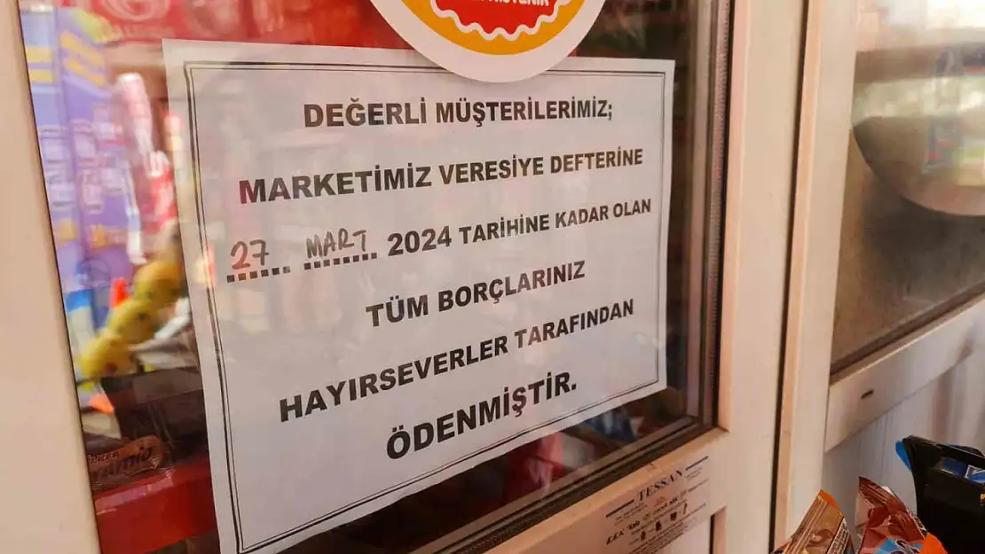 Hayırsever, bakkalın veresiye defterindeki borçları ödedi