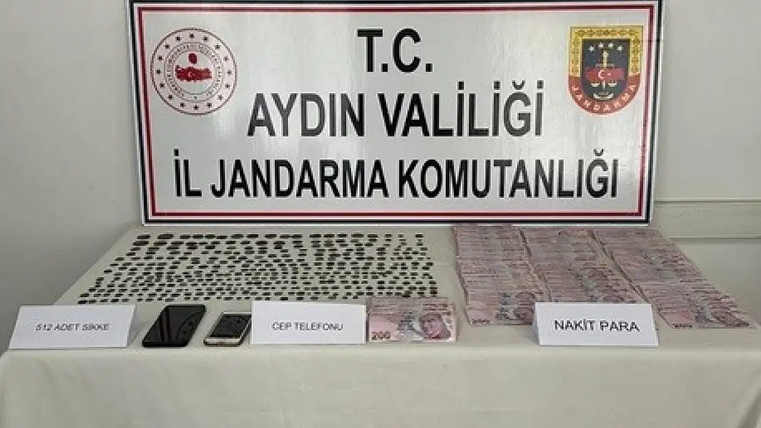 Karacasu'da durdurulan araçta tarihi eser ele geçirildi