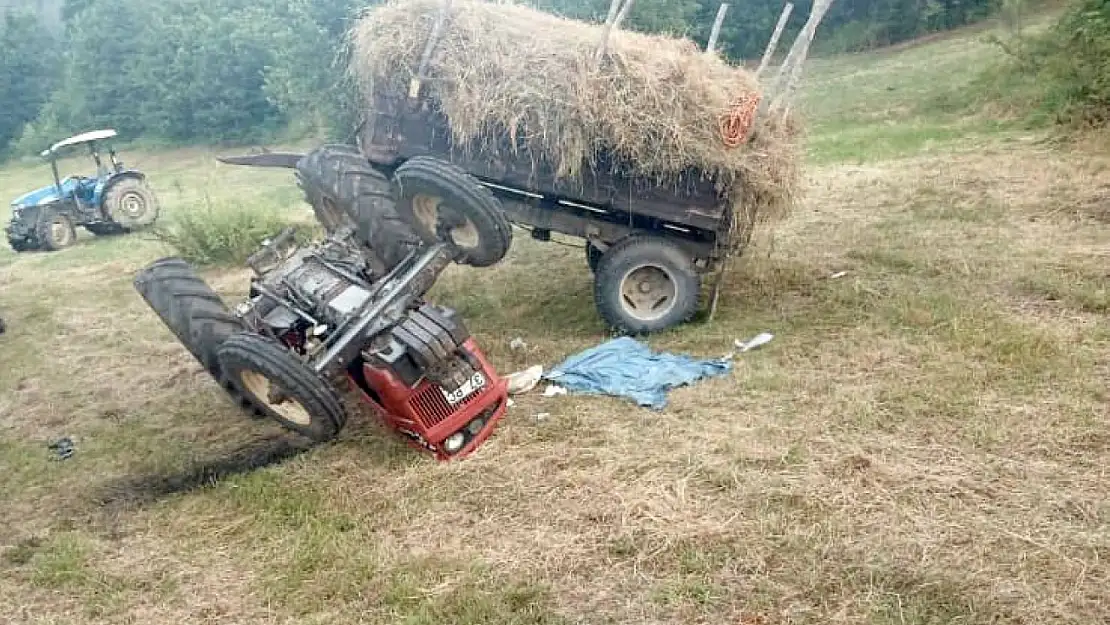 Tarlada devrilen traktörün altında kalan sürücü ağır yaralandı