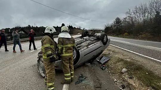 Takla atan otomobilden yara almadan kurtuldu