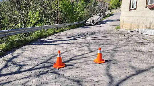 Ters dönen otomobilden yara almadan kurtuldu