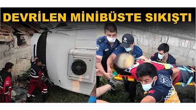 DEVRİLEN MİNİBÜSTE SIKIŞTI