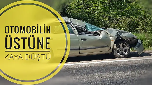 Otomobilin üzerine kaya düştü