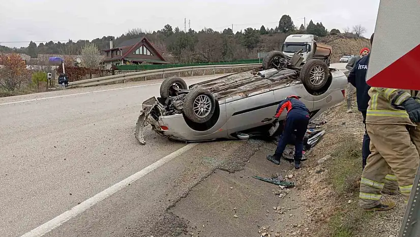 Takla atan otomobilden yara almadan kurtuldu